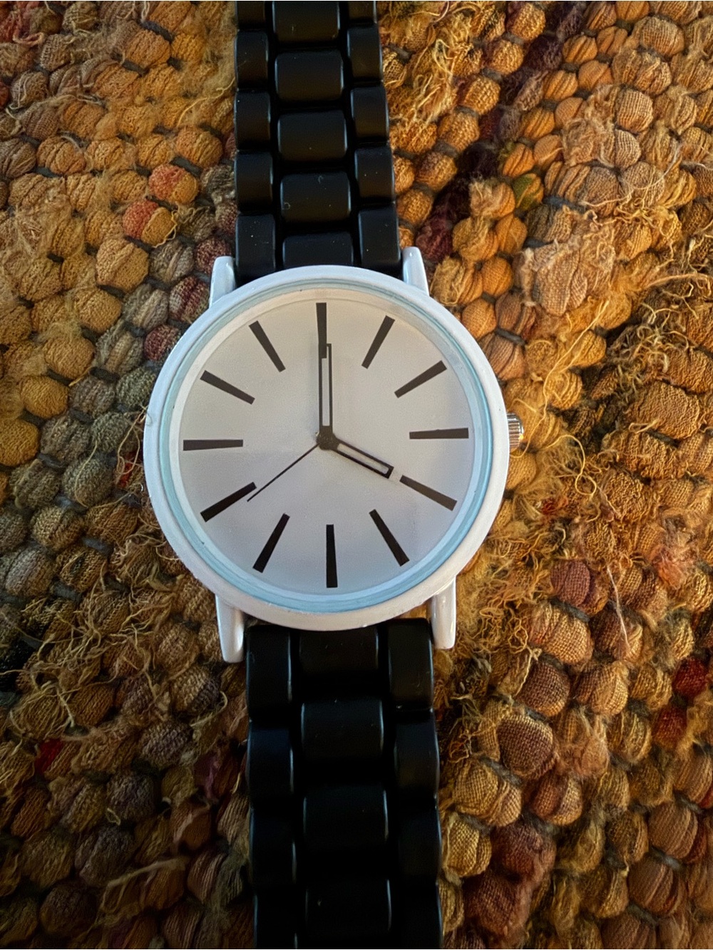 Black & white watch with a black silicone Strap with white face